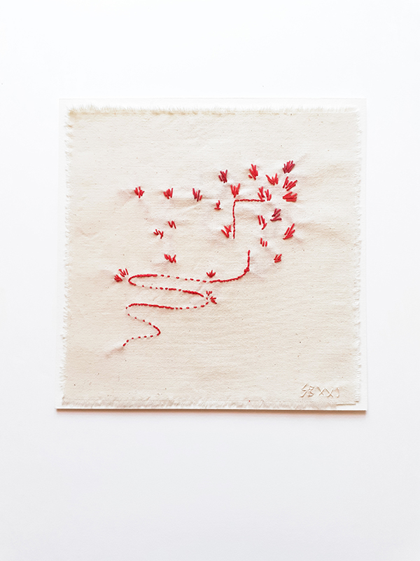 embroidered artistic experience 3 VR red yarns on off-white fabric