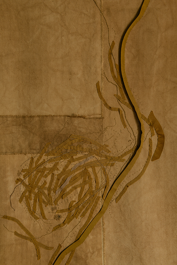 close up vegetal dyed abstract hand embroidered wall hanging